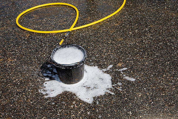 How to Remove Oil and Grease Stains Before Pressure Washing a Driveway
